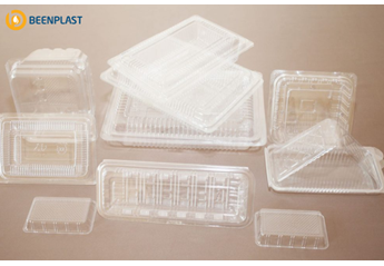 Production of plastic trays